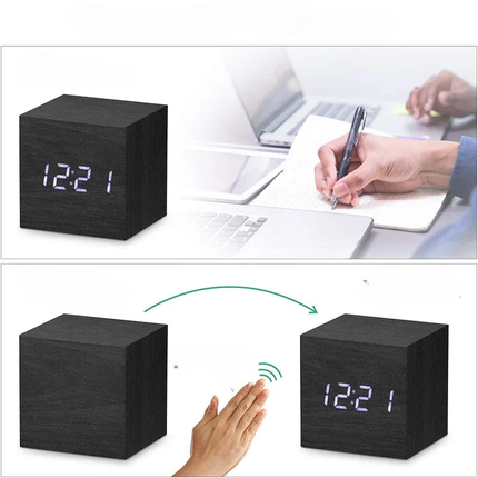 Svart digital väckarklocka i träkub
