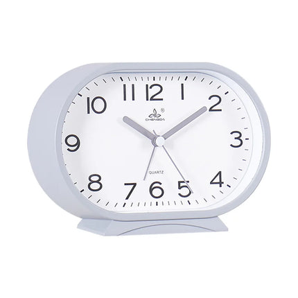 Oval analog väckarklocka för sängbordet