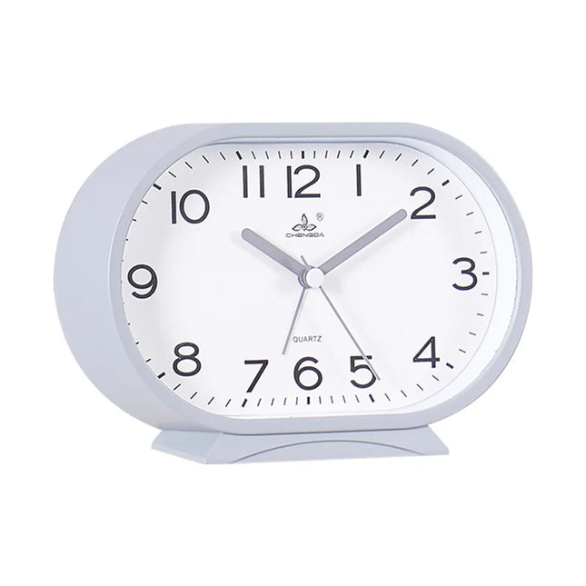 Oval analog väckarklocka för sängbordet