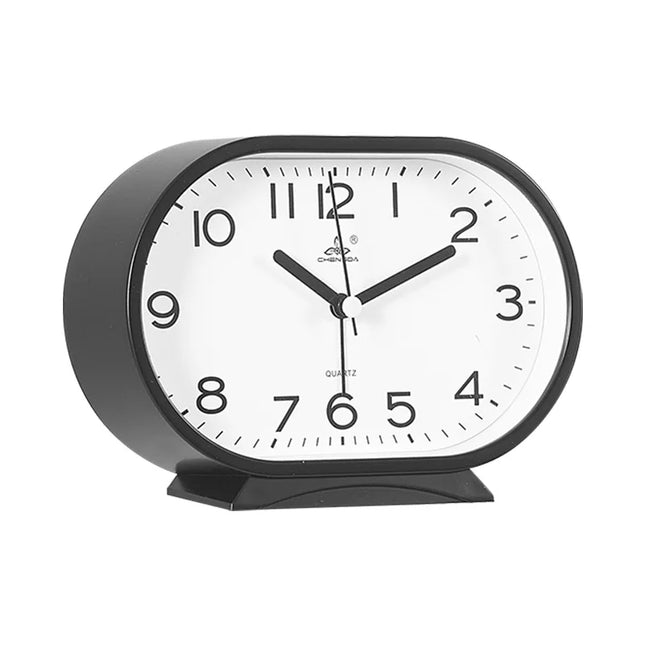 Oval analog väckarklocka för sängbordet
