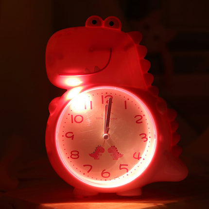 Rosa väckarklocka med dinosaurie barn