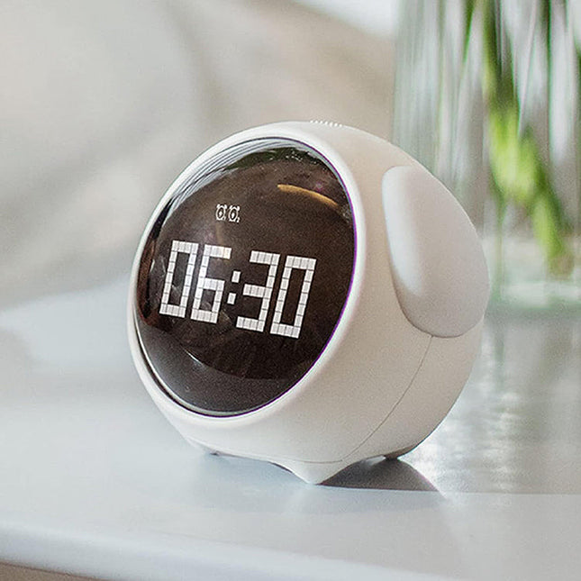 Digital väckarklocka med roliga ansiktsuttryck