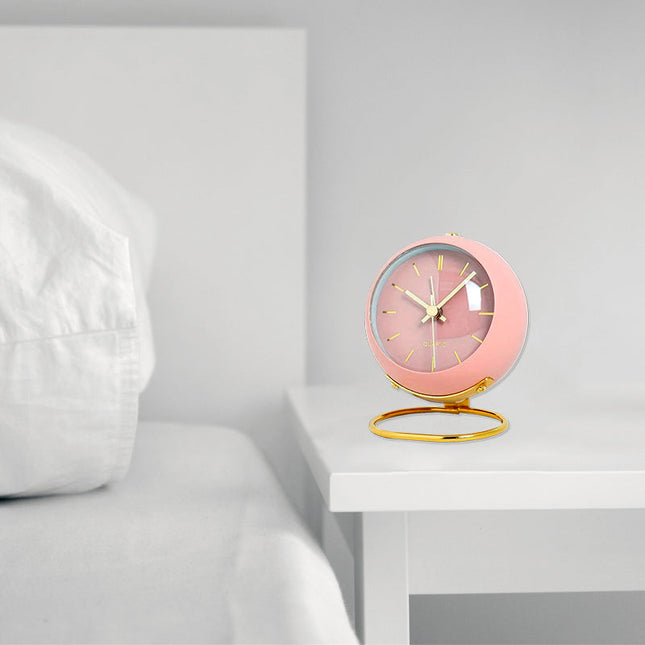 Rosa vintage väckarklocka med guldstativ